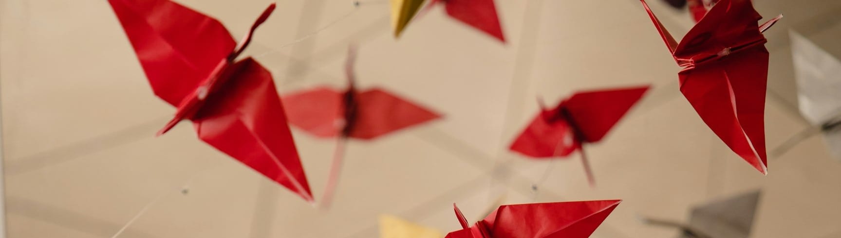 yellow and red paper boats